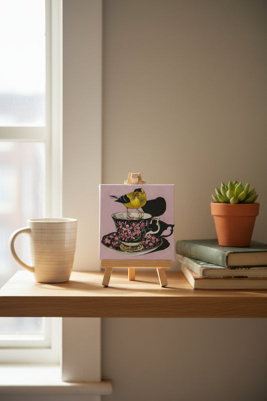 Goldfinch perched on a teacup having a cuppa — 10x10 canvas print by Birds on a Cup