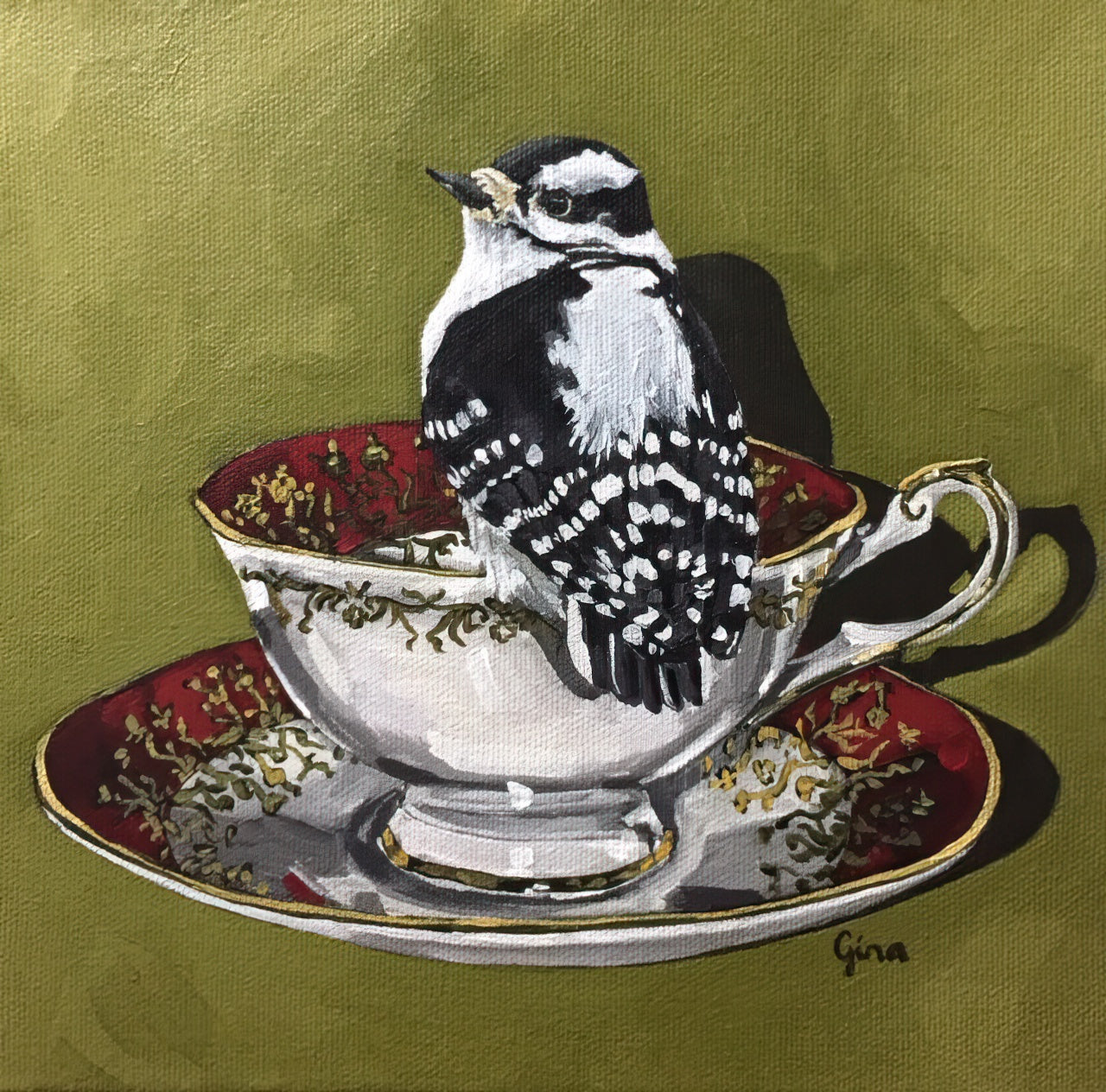 Female Downy Woodpecker perched on a crimson teacup — bird art card by Birds on a Cup