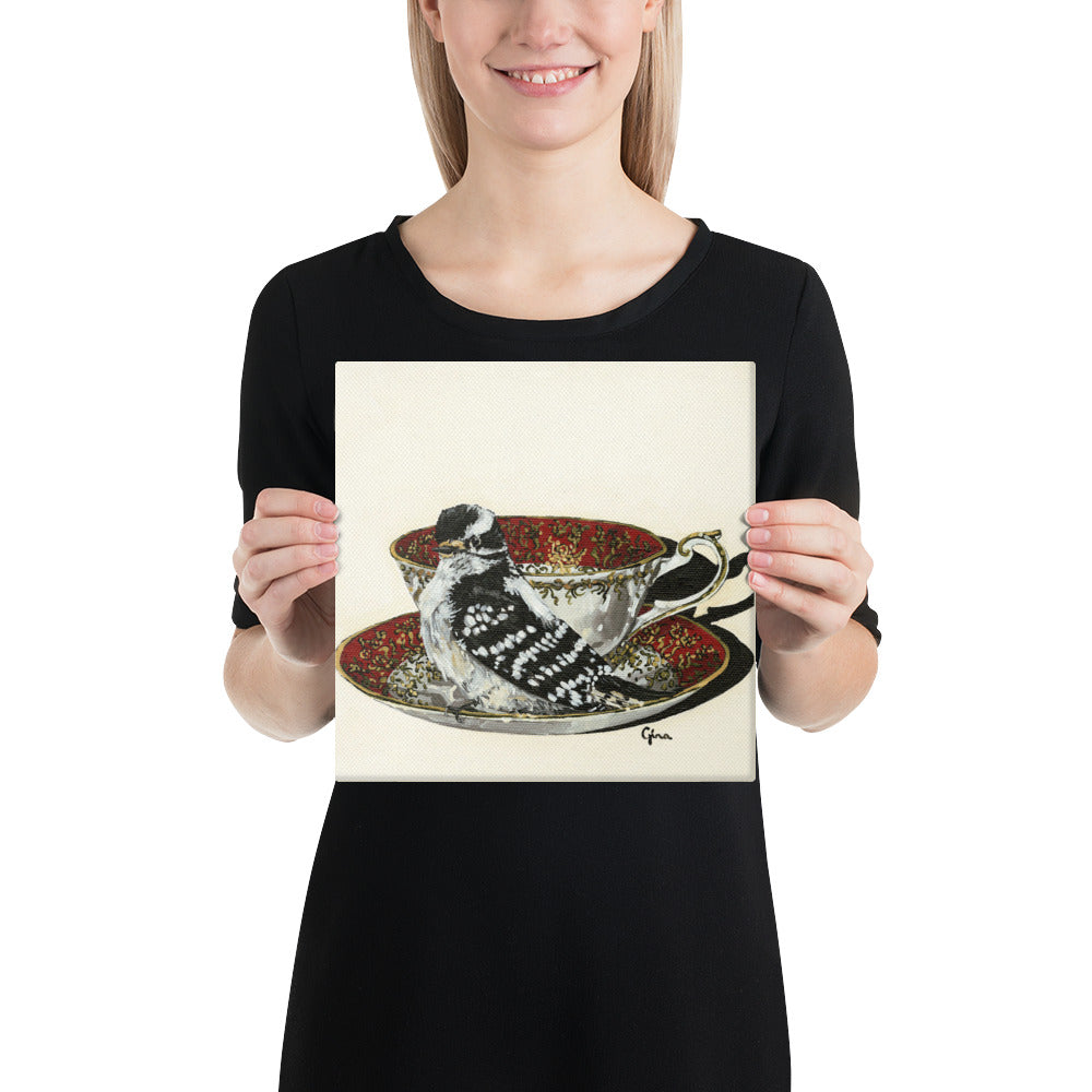Proud Downy Woodpecker on a ruby and gold teacup — 10x10 canvas print by Birds on a Cup