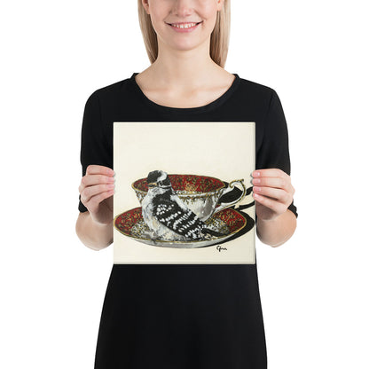 Proud Downy Woodpecker on a ruby and gold teacup — 10x10 canvas print by Birds on a Cup