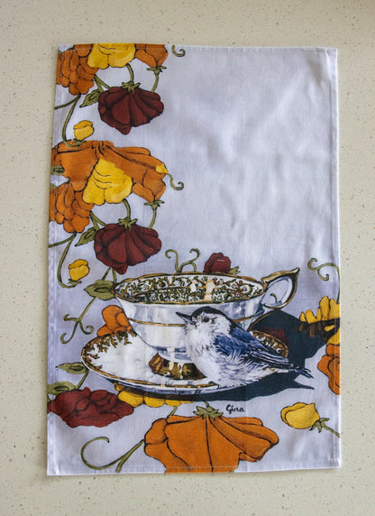 Nuthatch perched on a vintage saucer — bird art tea towel by Birds on a Cup