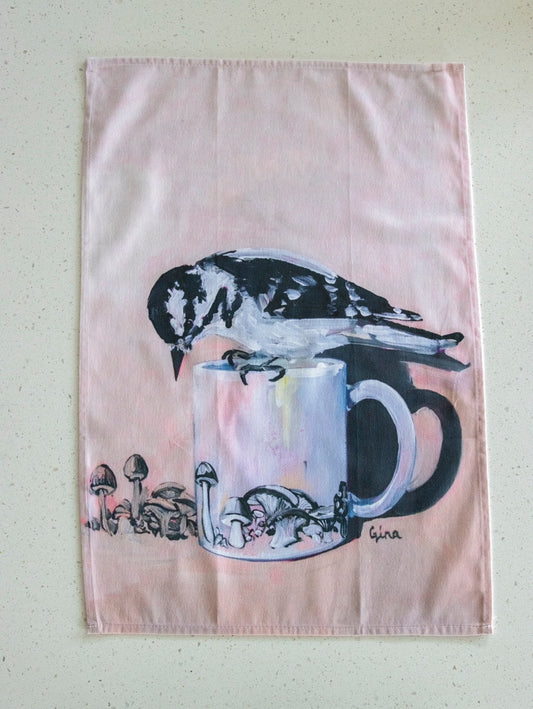 Downy Woodpecker perched on a mushroom mug — bird art tea towel by Birds on a Cup