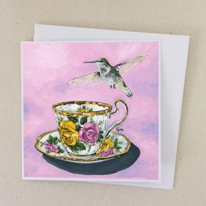 Female-Ruby-Throated-Hummingbird-in-Flight-over-Rose-Teacup-Card